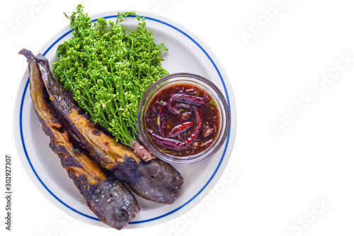 neem and sweet fish sauce with grilled catfish  isolate on white background