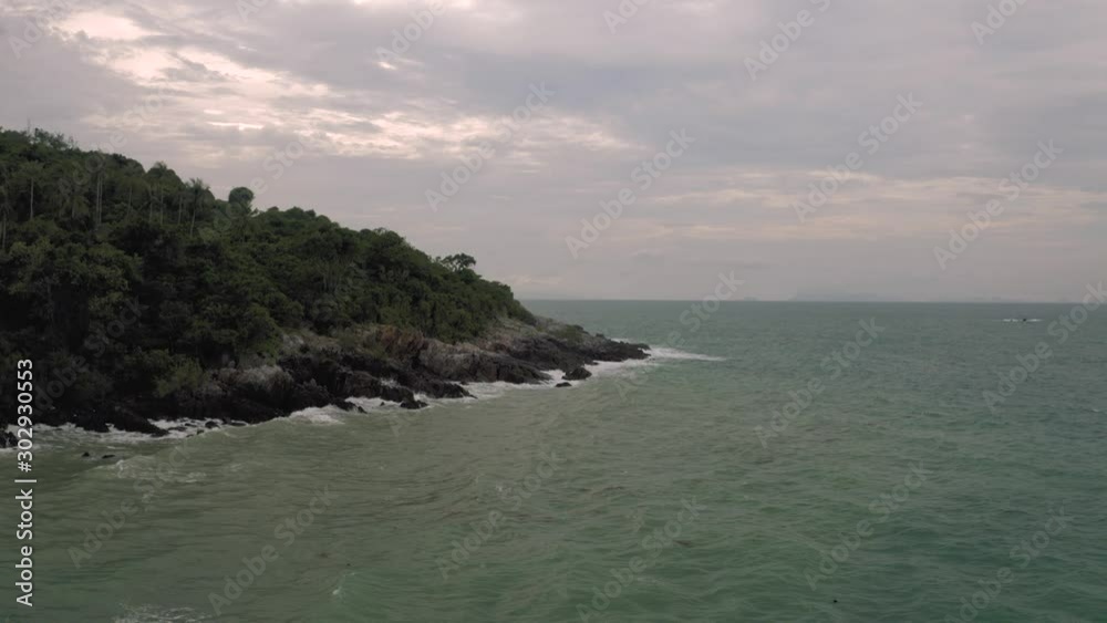 Coastline in Thailand., ocean waves breaking on the rocks, 4K Drone flight Coastline in Thailand., ocean waves breaking on the rocks, 4K Drone flight