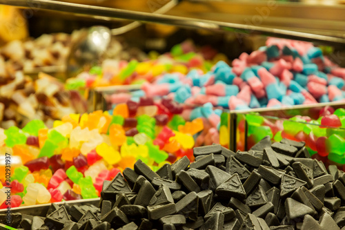 large showing of colorful gummy candies of a street seller photo