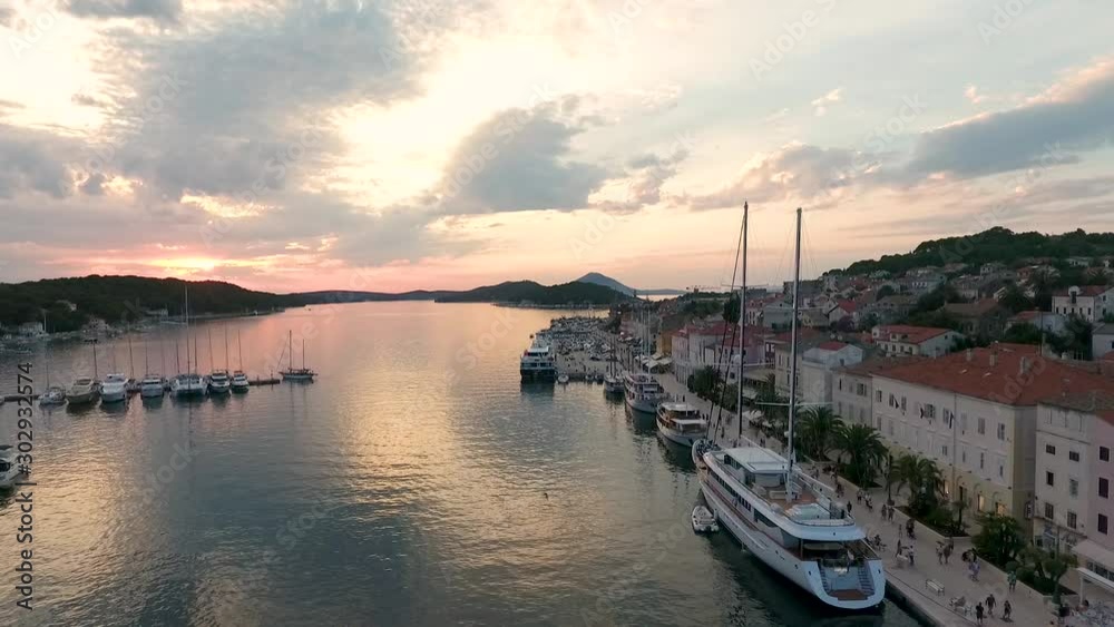 Aerial view of touristic sailing boat anchored at Veli Lošinj, Croatia. Aerial view of touristic sailing boat anchored at Veli Lošinj, Croatia.