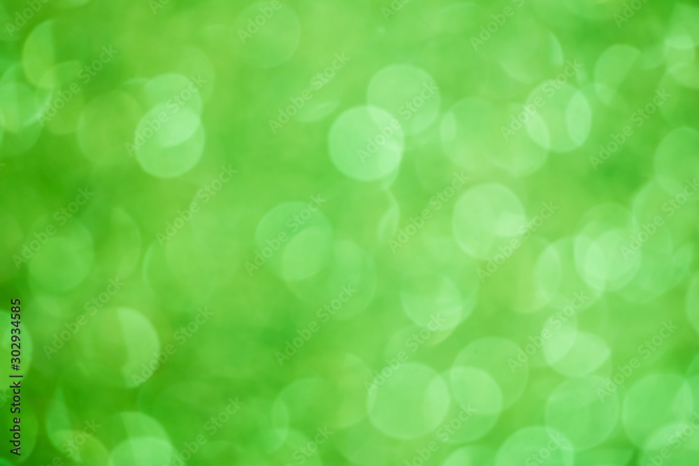 abstract blur or defocused lights bokeh on green background abstract blur or defocused lights bokeh on green background