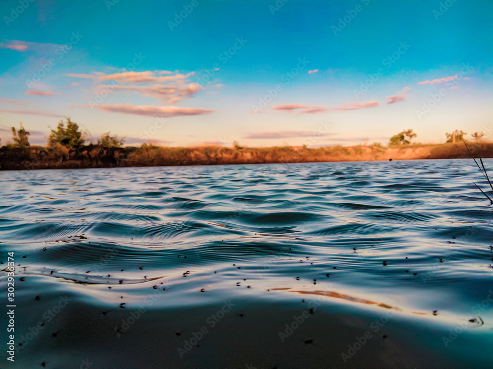 Beautiful sky water sunset over the lake