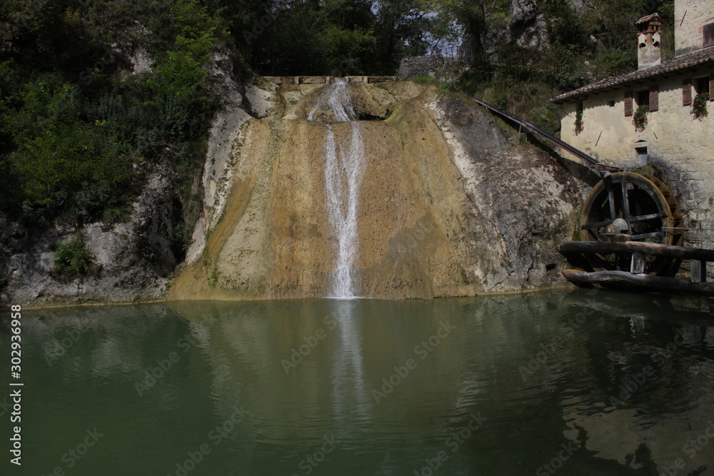 Old mill and beuatiful waterfall by Molinetto della Croda Old mill and beuatiful waterfall by Molinetto della Croda