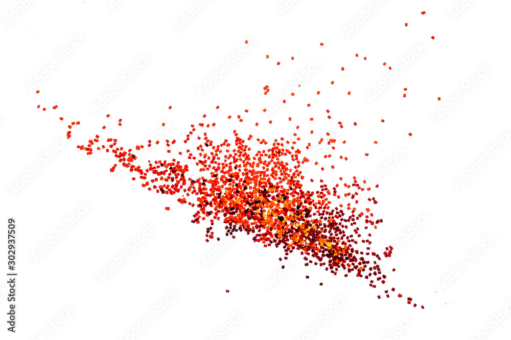 Fototapeta premium Red glitter powder splash or burst isolated on white background