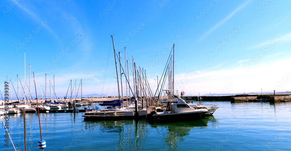 Sailing boats in a harbour 