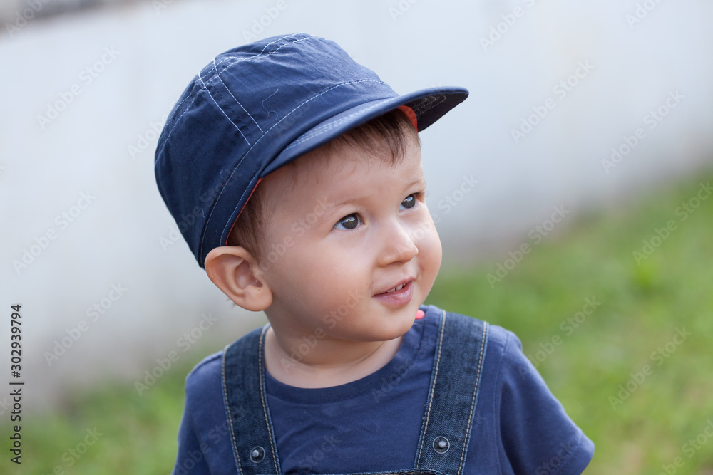 smiling baby boy with blue hat smiling baby boy with blue hat