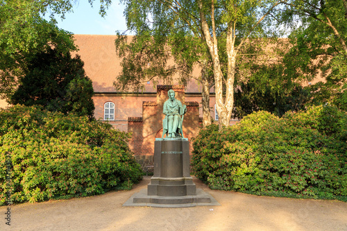 Copenhagen, Denmark. Soren Kierkegaard Statue I Bibliotekshaven (1635-1699), Sculptor Louis Hasselriis (1844 - 1912) photo