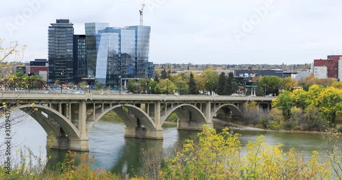 Saskatoon, Canada skyline by river 4K