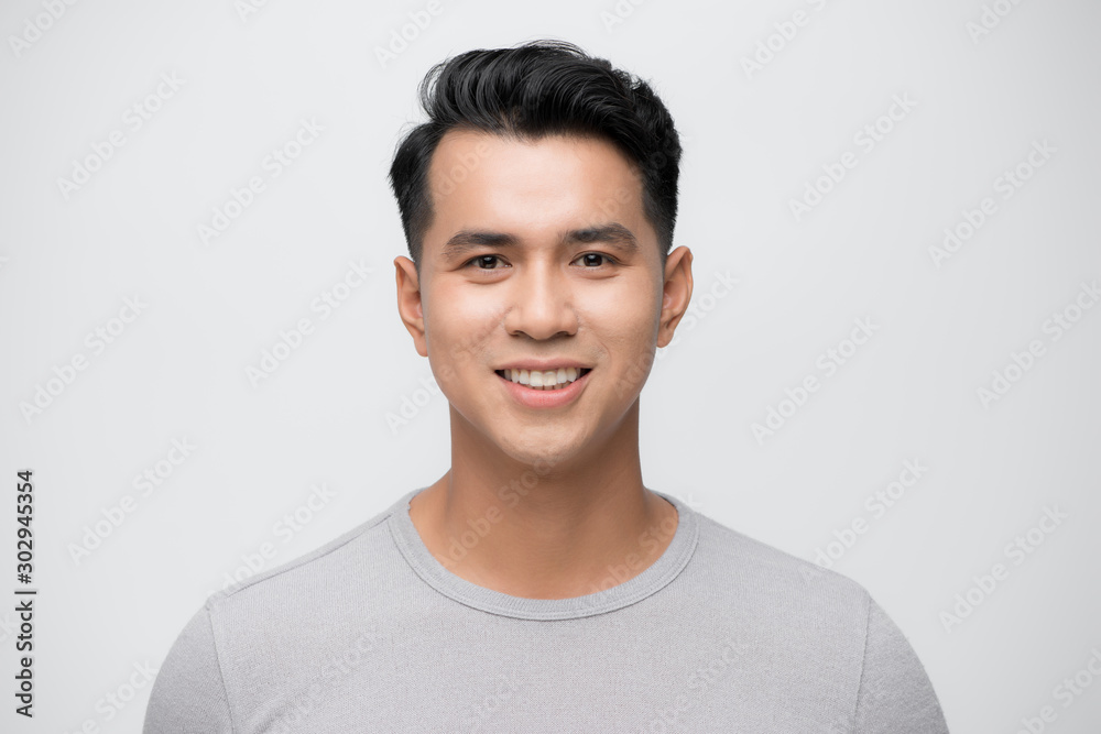 Young Asian man close up shot isolated on white Stock Photo
