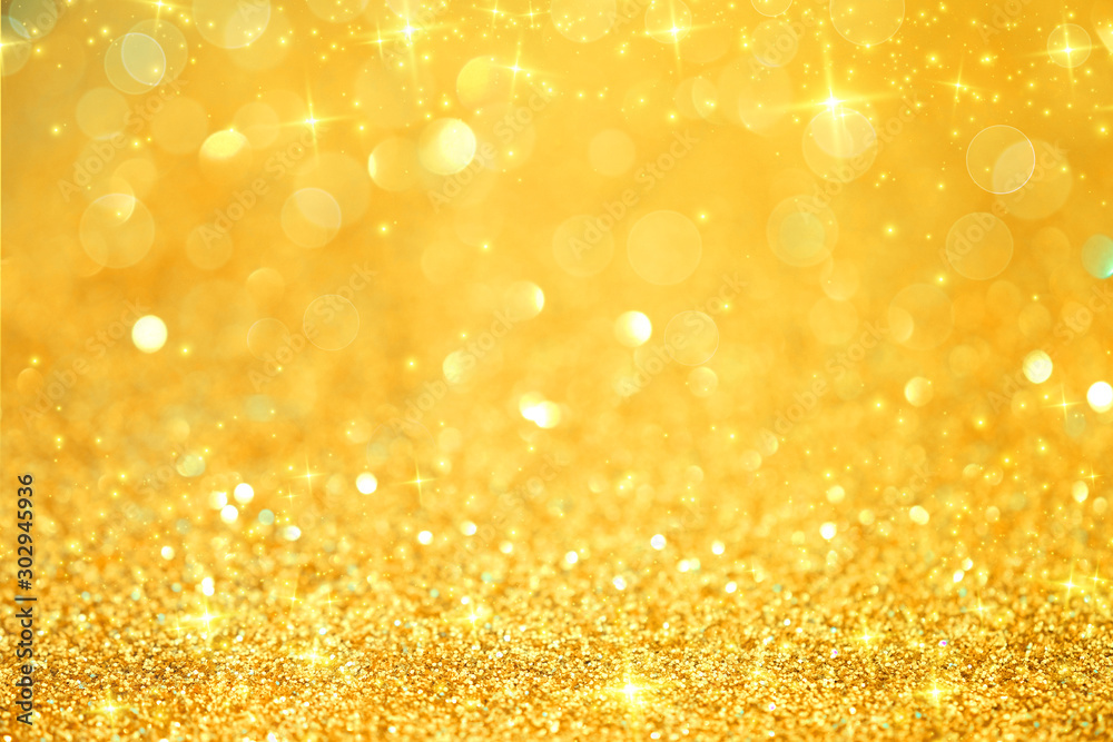 Luxury gold glitter with bokeh background, de-focused. Luxury gold glitter with bokeh background, de-focused.