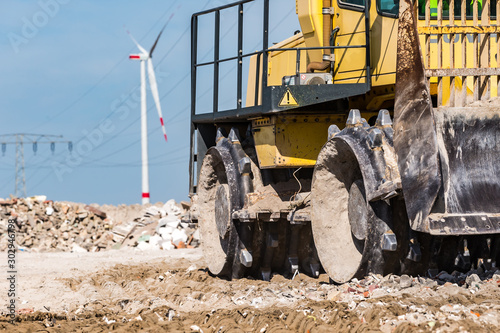 Obraz na plátně compactor at landfill