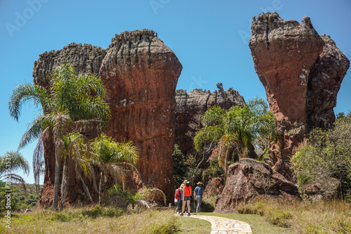 Tourists walking among sandstone geological monuments (Arenitos) in Vila Velha State Park - Ponta Grossa, Paraná, Brazil photo