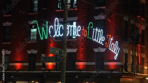 Welcome to Little Italy neon sign on Mulberry street in New York City, famous place for fine dining in numerous restaurants across this Italian neighborhood