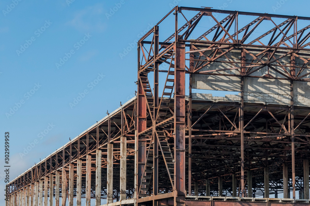 A fragment of the rusty structure of the old factory