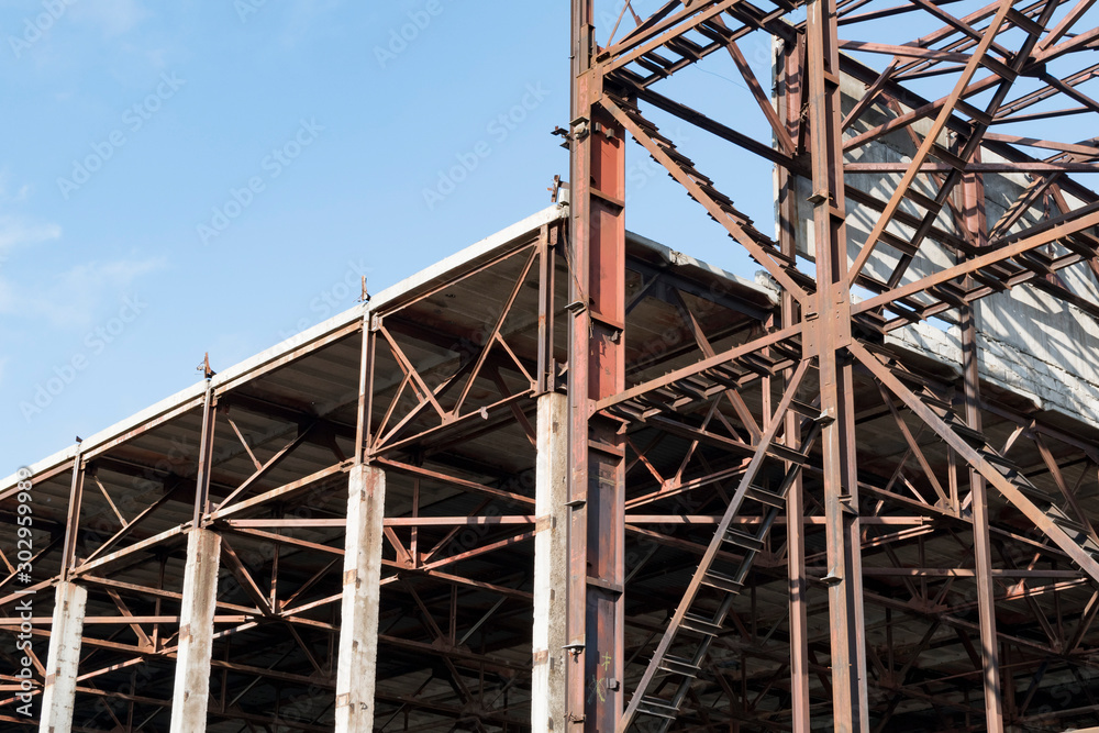 A fragment of the rusty structure of the old factory