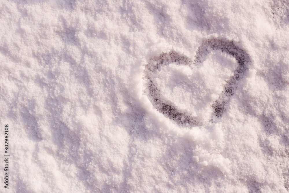 Heart drawn by finger on fresh snow, Heart on snow. Heart drawn by finger on fresh snow, Heart on snow.