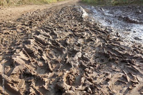 Abstract background. Tire tracks in the mud © Aleksandr