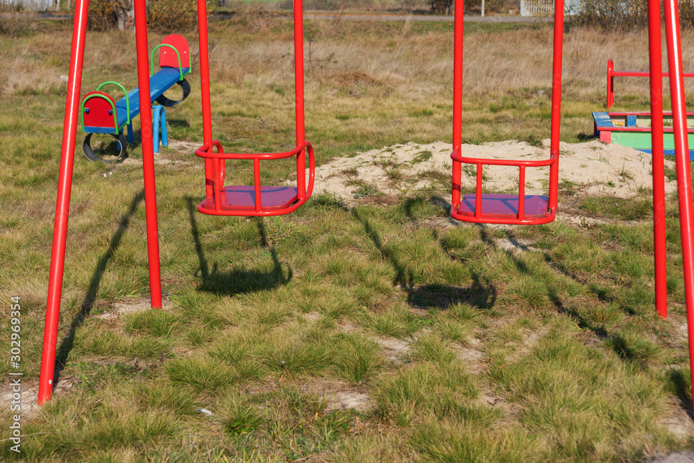 Playground in the countryside, with different types of swings and swings for children.