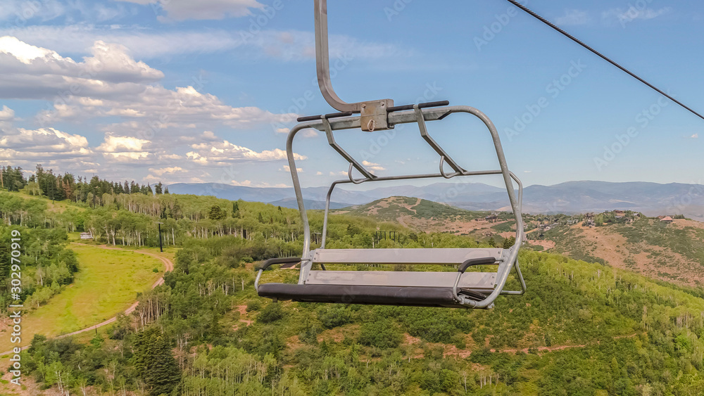Panorama Off season months in Park City ski resort with focus on chairlifts against sky Panorama Off season months in Park City ski resort with focus on chairlifts against sky