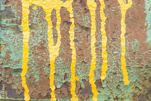 close up of damaged concrete with yellow and green color covered.    © Thipphawan