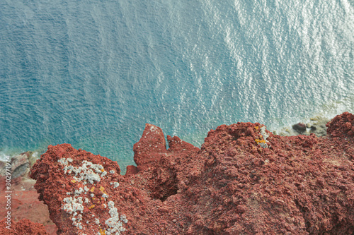 Looking down from the top of a cliff into the Atlantic Ocean from Tenerife Spain photo