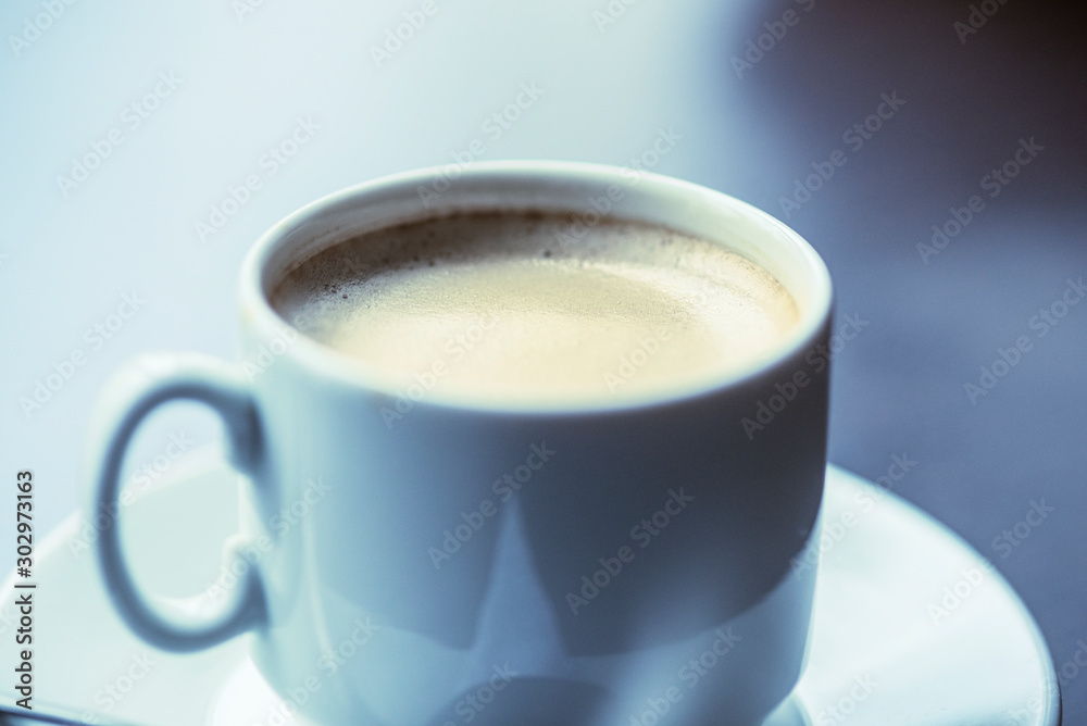 Cup of coffee in a cafe. Photographed close-up. Cup of coffee in a cafe. Photographed close-up.