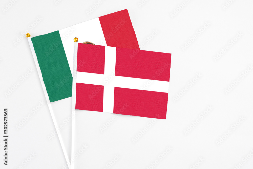 Denmark and Mexico stick flags on white background. High quality fabric, miniature national flag. Peaceful global concept.White floor for copy space.
