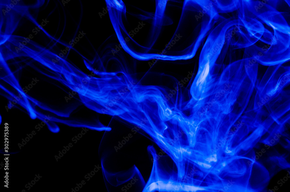 Fototapeta premium Nature Abstract: The Delicate Beauty and Elegance of a Wisp of Blue Smoke