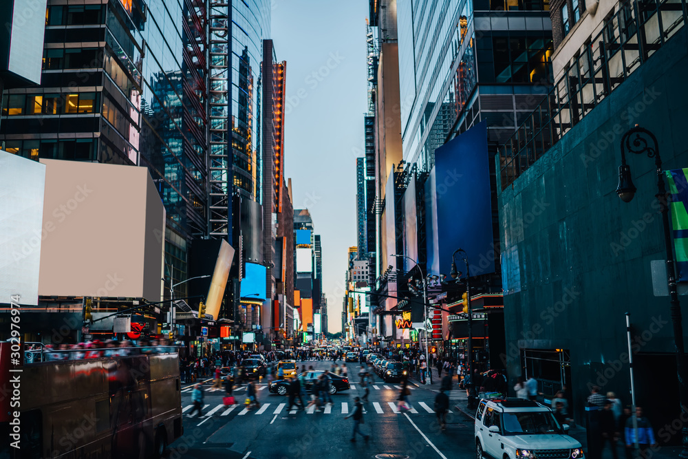 Times square view with blank billboards and copy space for advertising or commercial content on building facades, famous touristic place in New York with busy traffic and publicity area on streets . - obrazy, fototapety, plakaty 