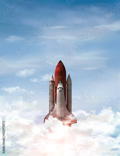 Fototapeta Naklejka Na Ścianę i Meble -  Space shuttle take off in outer space from Earth. Rocket in sky and clouds. Elements of this image furnished by NASA