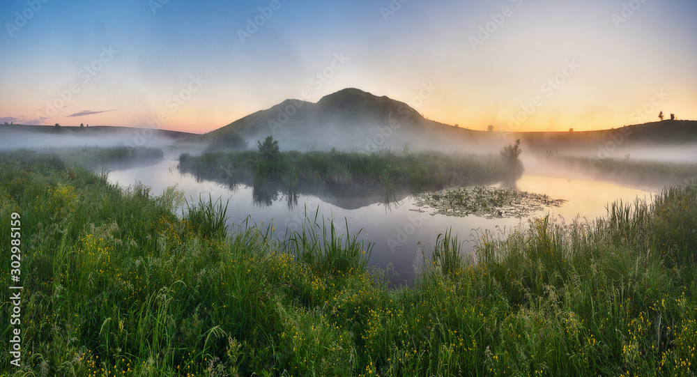 spring morning. foggy dawn. picturesque foggy river