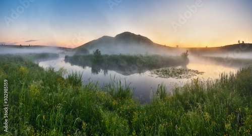 spring morning. foggy dawn. picturesque foggy river