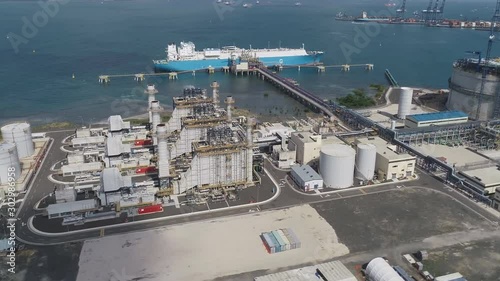 Aerial view of Port of Bandar Abbas, Iran. View of oil refineries. Bandar Abbas or Bandar-e is a port city and capital of Hormozgan Province on the southern coast of Iran, on the Persian Gulf.