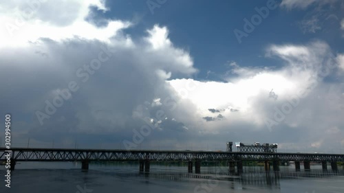 Wallpaper Mural thunderclouds and bridge over the river Torontodigital.ca