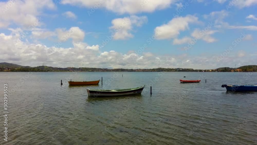 Boats , blue sky and tranquility Boats , blue sky and tranquility