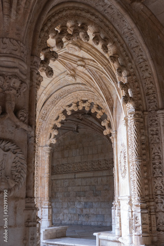 Archways in an old monastery in Portugal vertical 
