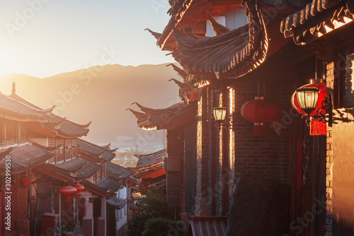 Sunrise view of the empty city street. Lijiang. China.