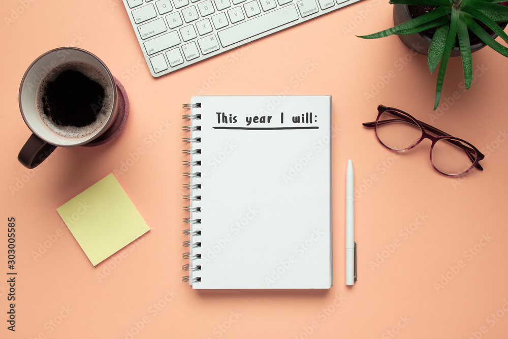 Stock photo of 2020 new year notebook with list of resolutions and objects on pink background - obrazy, fototapety, plakaty 