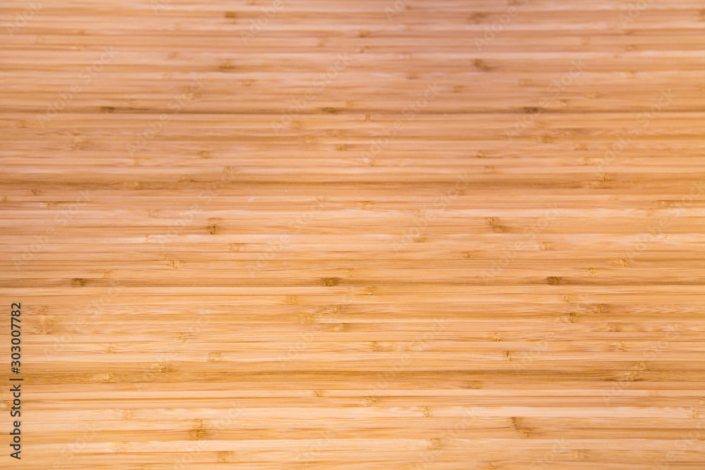 Background of yellow bamboo strips with knots of bright wood structure. Backgrounds, structures, designs. Background of yellow bamboo strips with knots of bright wood structure. Backgrounds, structures, designs.