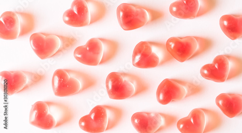 Pink heart shaped gummies pattern.