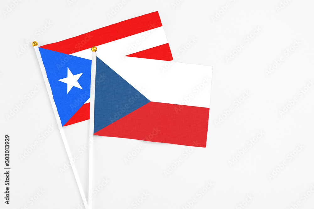 Czech Republic and Puerto Rico stick flags on white background. High quality fabric, miniature national flag. Peaceful global concept.White floor for copy space. Czech Republic and Puerto Rico stick flags on white background. High quality fabric, miniature national flag. Peaceful global concept.White floor for copy space.