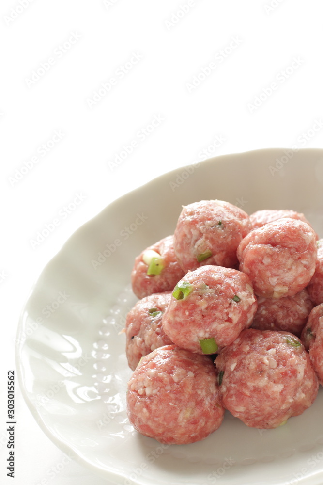 Homemade Chinese pork meat ball on dish for hot pot cooking image