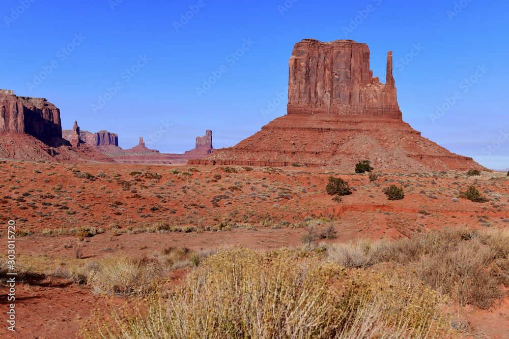 The Red rock desert landscape of Monument Valley, Navajo Tribal Park in the southwest USA in Arizona and Utah, America