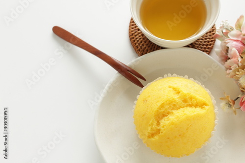 yellow steamed bun on dish for lemon cake image