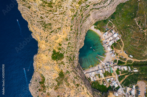 The Inland Sea and tourist boat. Dwejra is a lagoon of seawater on the island of Gozo. Aerial view. Mediterranean sea. Malta 