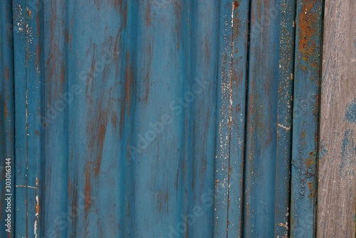 blue metal texture from an old dark shabby iron wall