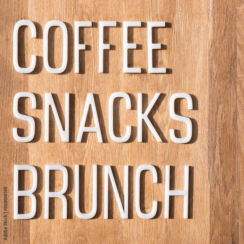 Word writing text Coffee, Snacks, Brunch. Coffee break background. Business concept of Break from work Relax eat drink rest. White volumetric words of food and drink. Symbol, sign for break