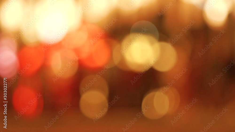 blur road/street in Chingmai Thailand by night with bokeh of Night market.