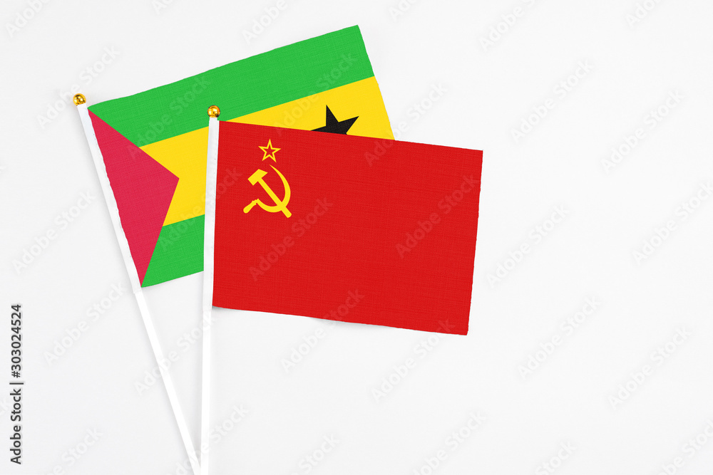 Soviet Union and Saudi Arabia stick flags on white background. High quality fabric, miniature national flag. Peaceful global concept.White floor for copy space. Soviet Union and Saudi Arabia stick flags on white background. High quality fabric, miniature national flag. Peaceful global concept.White floor for copy space.