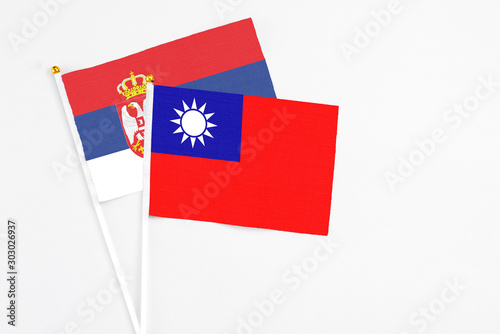 Taiwan and Serbia stick flags on white background. High quality fabric, miniature national flag. Peaceful global concept.White floor for copy space. Free Download Taiwan and Serbia stick flags on white background. High quality fabric, miniature national flag. Peaceful global concept.White floor for copy space. - GFXLoad